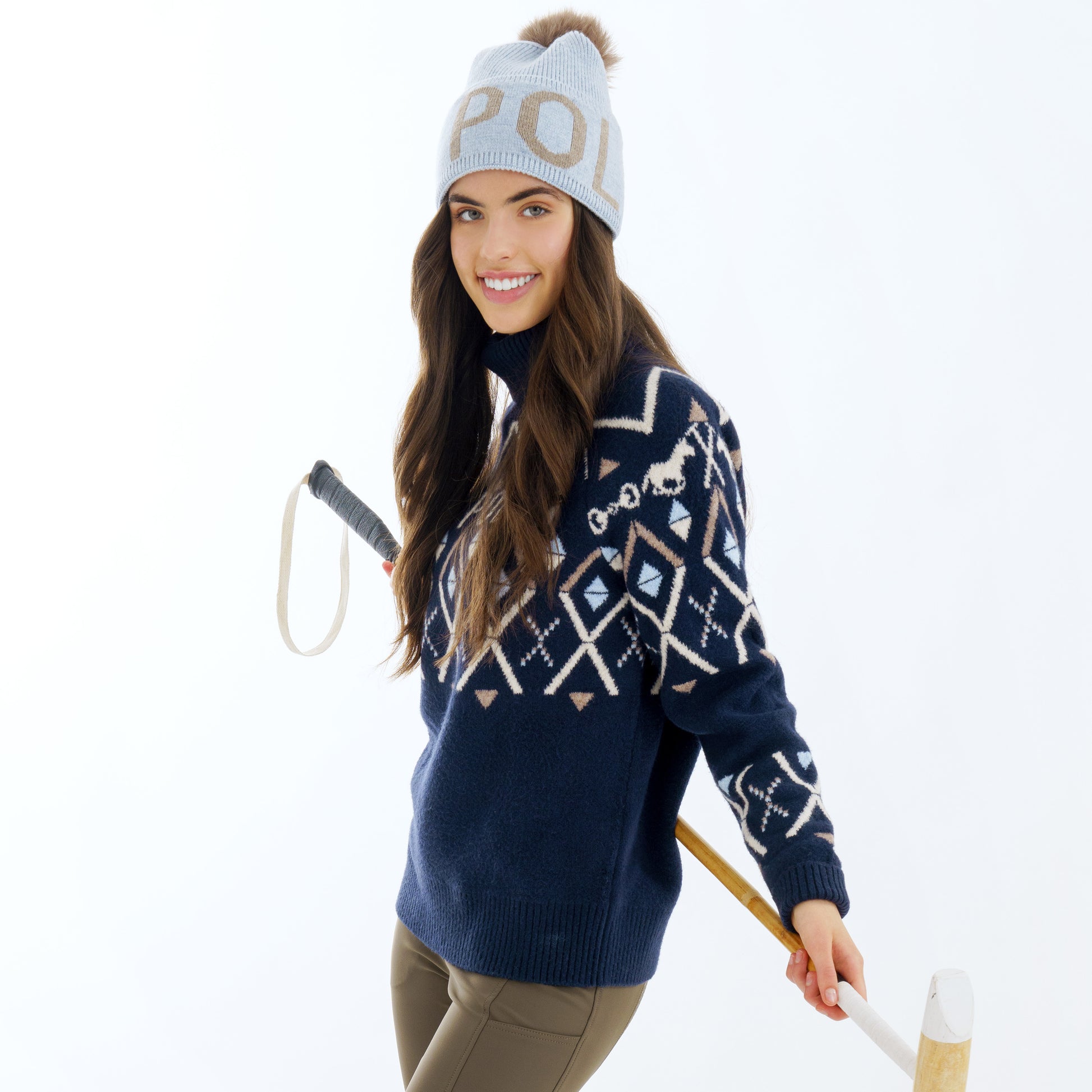 HV Polo Dorian pullover met luxe jacquard breisel en turtle-hals. Comfortabel, stijlvol en warm met uniek paardenbit-detail en kleurrijk patroon. Verkrijgbaar bij Livin Horse Shop