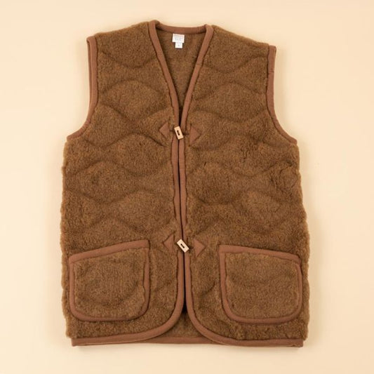 Moonrise wollen dames vest met 3D print – Gemaakt van 100% merinowol met houten knopen en zakken. Luxe, warm en ademend vest met perfecte pasvorm en moderne uitstraling.