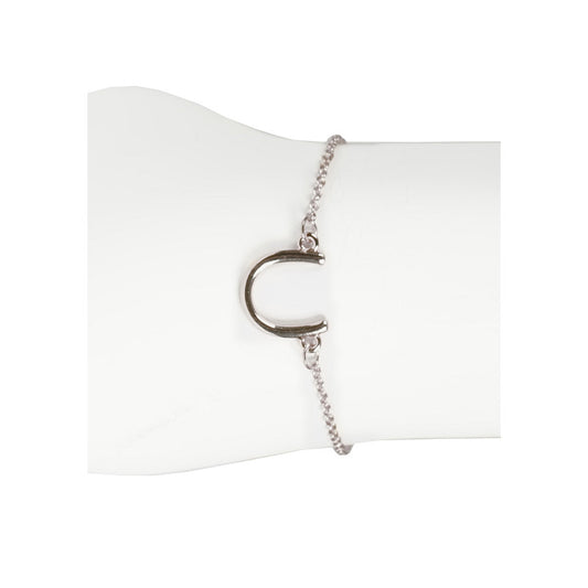 Horka. Stijlvolle brassèn armband met hoefijzer hanger – het gelukssymbool voor dames. Verstelbaar van 19 tot 24 cm. Bestel nu en breng geluk aan je pols!